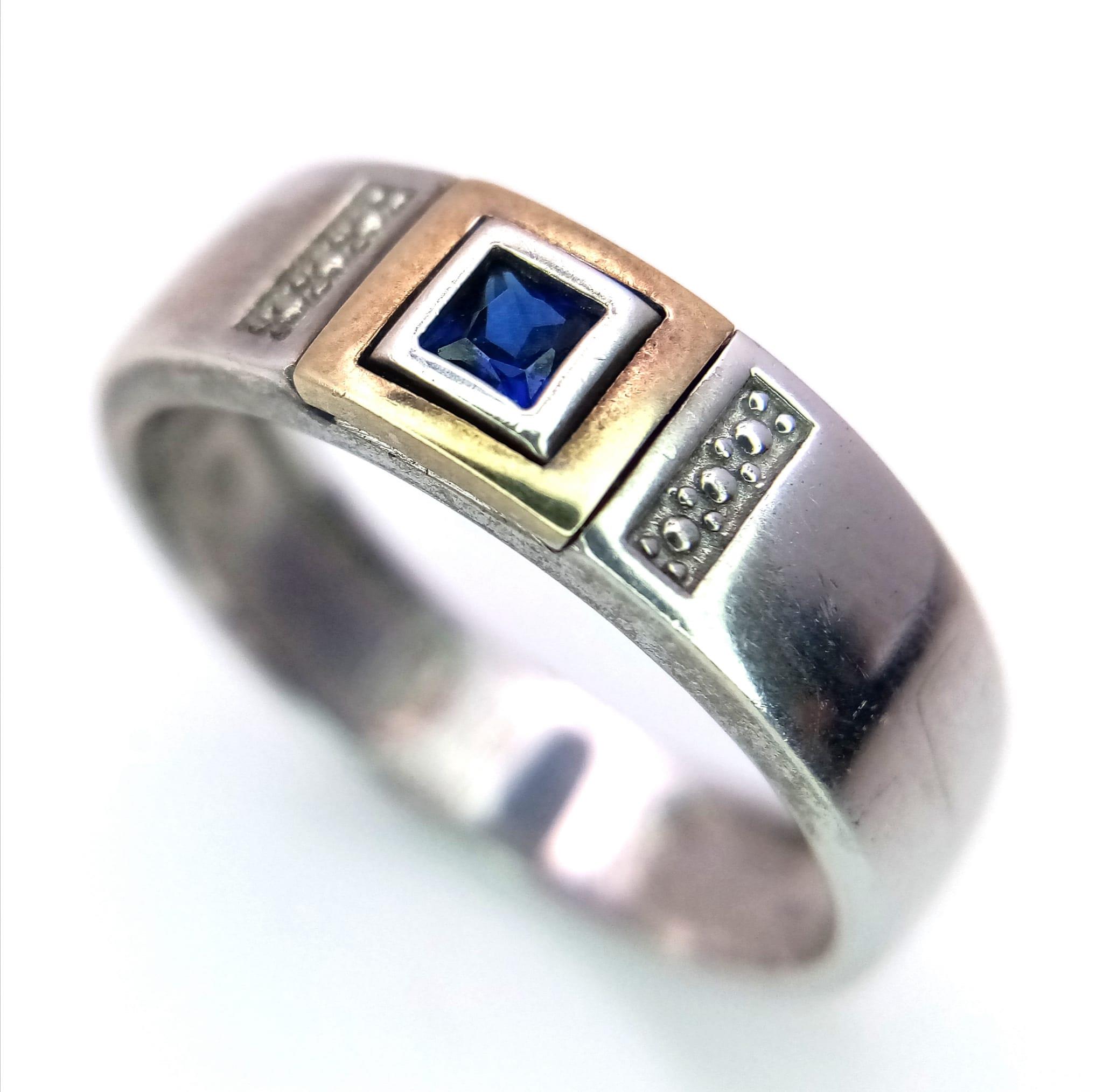 A 925 Silver Blue Stone Gents Ring. Size U.