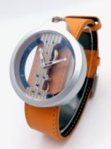 A VERTICALE DOUBLE SKELETON TOP WIND WATCH ON A BROWN LEATHER STRAP