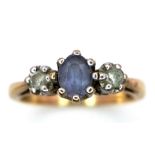 A 9K YELLOW GOLD DIAMOND & GEM 3 STONE RING. TOTAL WEIGHT 2.1G. SIZE L