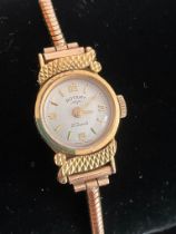 Ladies Vintage 9 carat GOLD ROTARY WRISTWATCH Mounted on a 9 carat gold snake chain bracelet.
