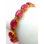 An Oval Cut Ruby and Diamond Gemstone Tennis Bracelet set in Gold Plated 925 Silver. 50ctw Rubies