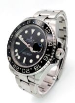 A Rolex GMT - Master II Automatic Fents Watch. Model 116710LN. Stainless steel bracelet and case -