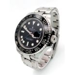 A Rolex GMT - Master II Automatic Fents Watch. Model 116710LN. Stainless steel bracelet and case -