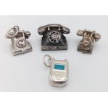 4 X STERLING SILVER TELEPHONE CHARMS - 3 OLD SCHOOL PHONES AND A FLIP MOBILE. 14.5G