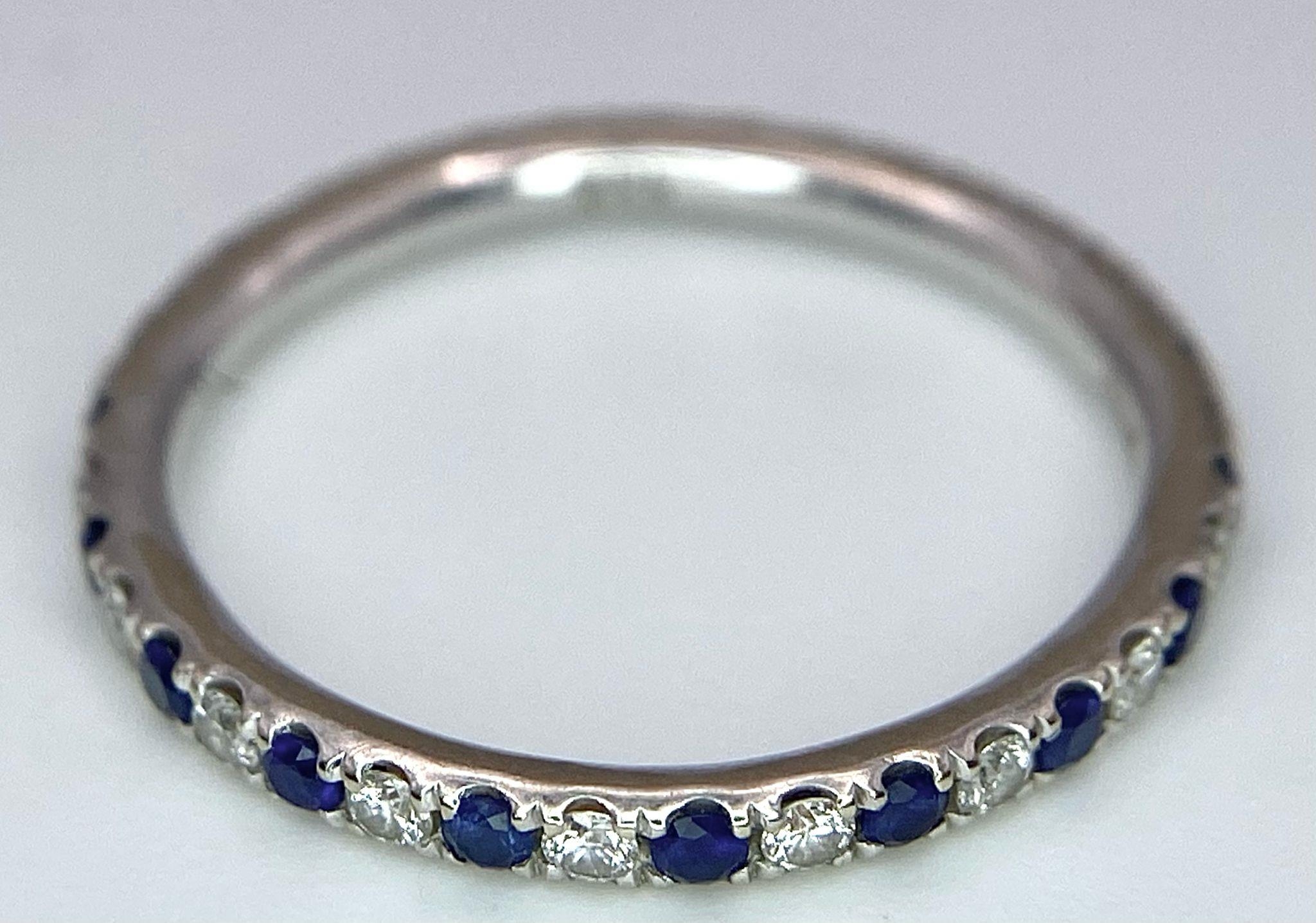 A 14ct white gold diamond and sapphire full eternity ring set with 18 diamonds and 18 sapphires, 1. - Image 3 of 5