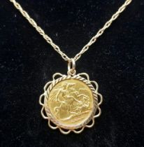 A 1900 22k Gold Queen Victoria Half Sovereign set in a 9K Gold Casing on a 9K Yellow Gold Chain -