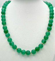 A Jade Bead Necklace with 9K Gold Clasp. 42cm length.