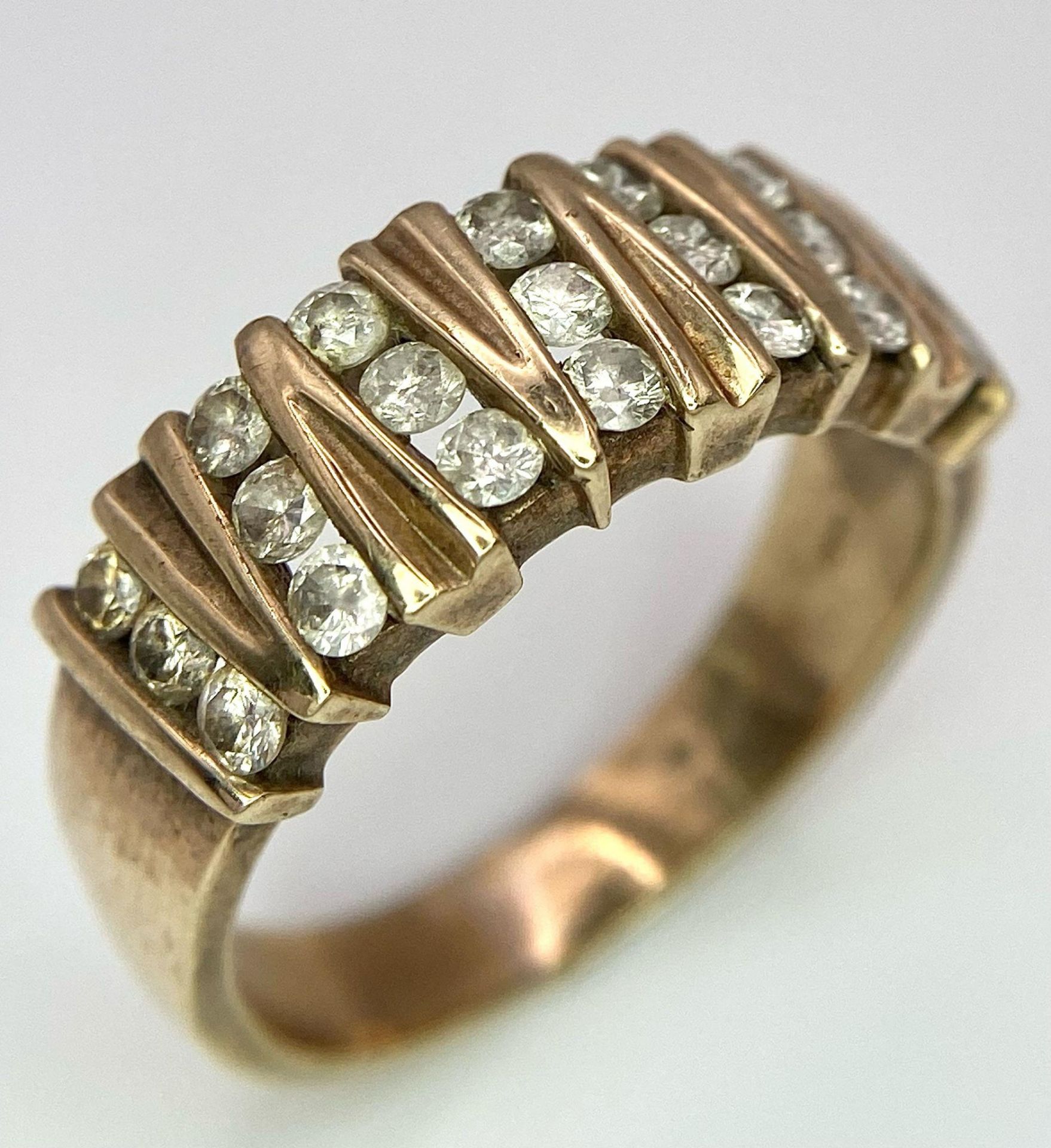 A Vintage 9K Yellow Gold 21 Diamond Ring. 1ctw of brilliant round cut diamonds. Size T. 5.9g total - Image 3 of 7