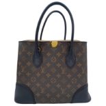 A Louis Vuitton Monogram Flandrin Handbag. Leather exterior with gold-toned hardware, two rolled