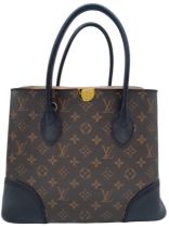 A Louis Vuitton Monogram Flandrin Handbag. Leather exterior with gold-toned hardware, two rolled