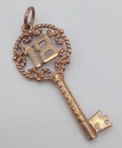 A 9K yellow gold '18' key pendant 4cm X 1.8cm, 4.1g ref: SH1362I