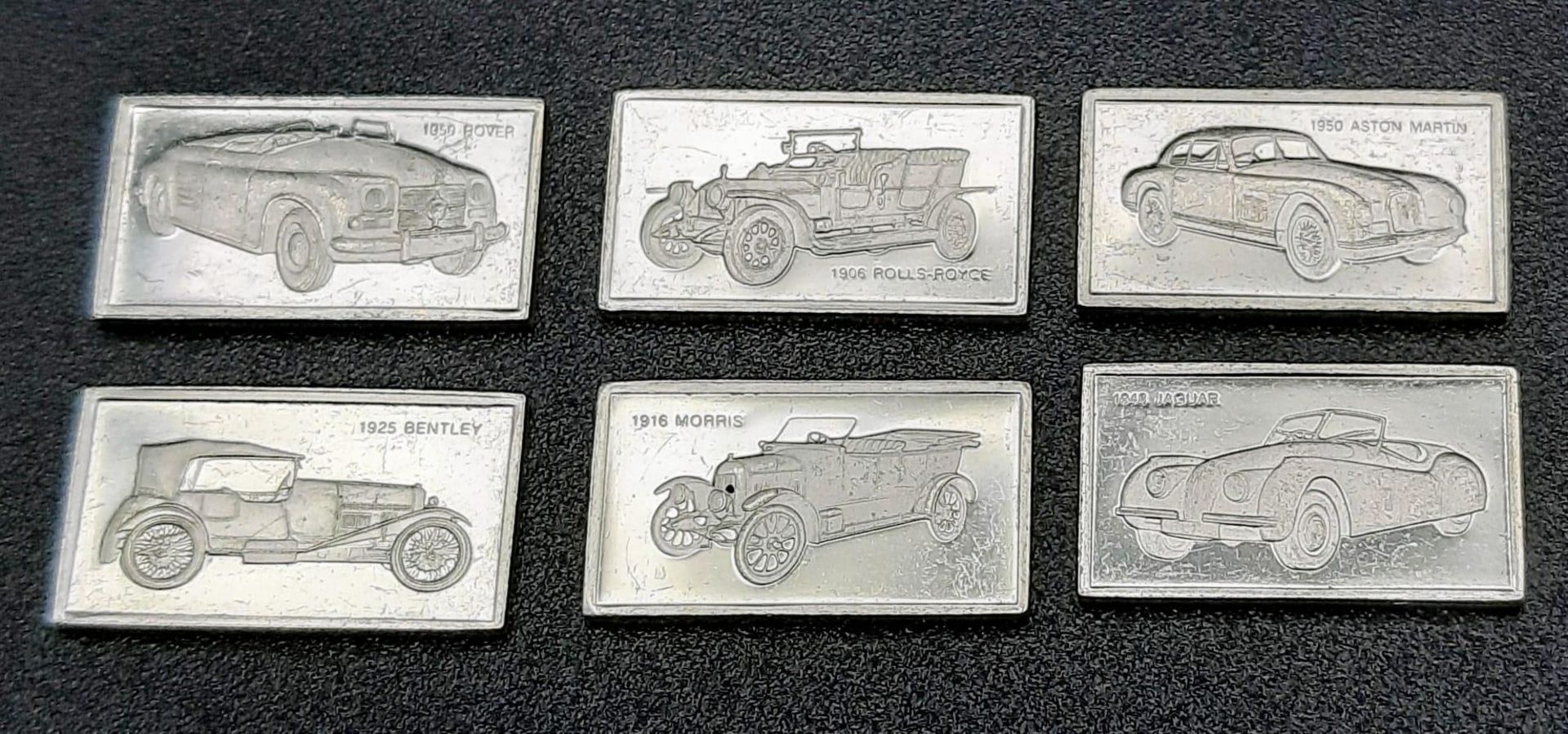 A SELECTION OF 6 BEST BRITISH CAR MANUFACTURERS MINI PLAQUES WITH LOGO AND CARS AND DATES. BRANDS TO