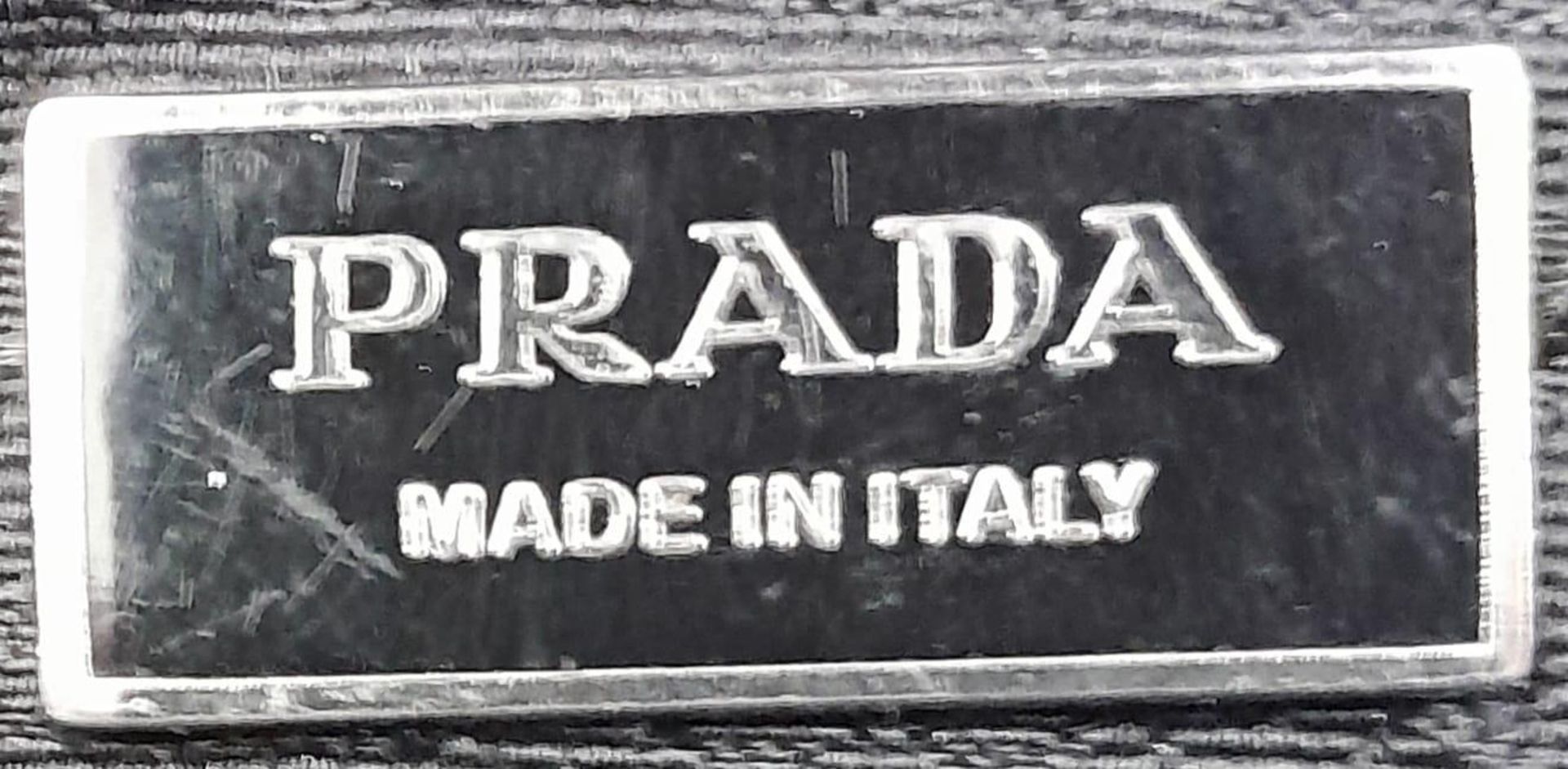 A Prada Black Vitello Shoulder Bag. Leather exterior with silver-toned hardware, two straps, push - Bild 7 aus 10