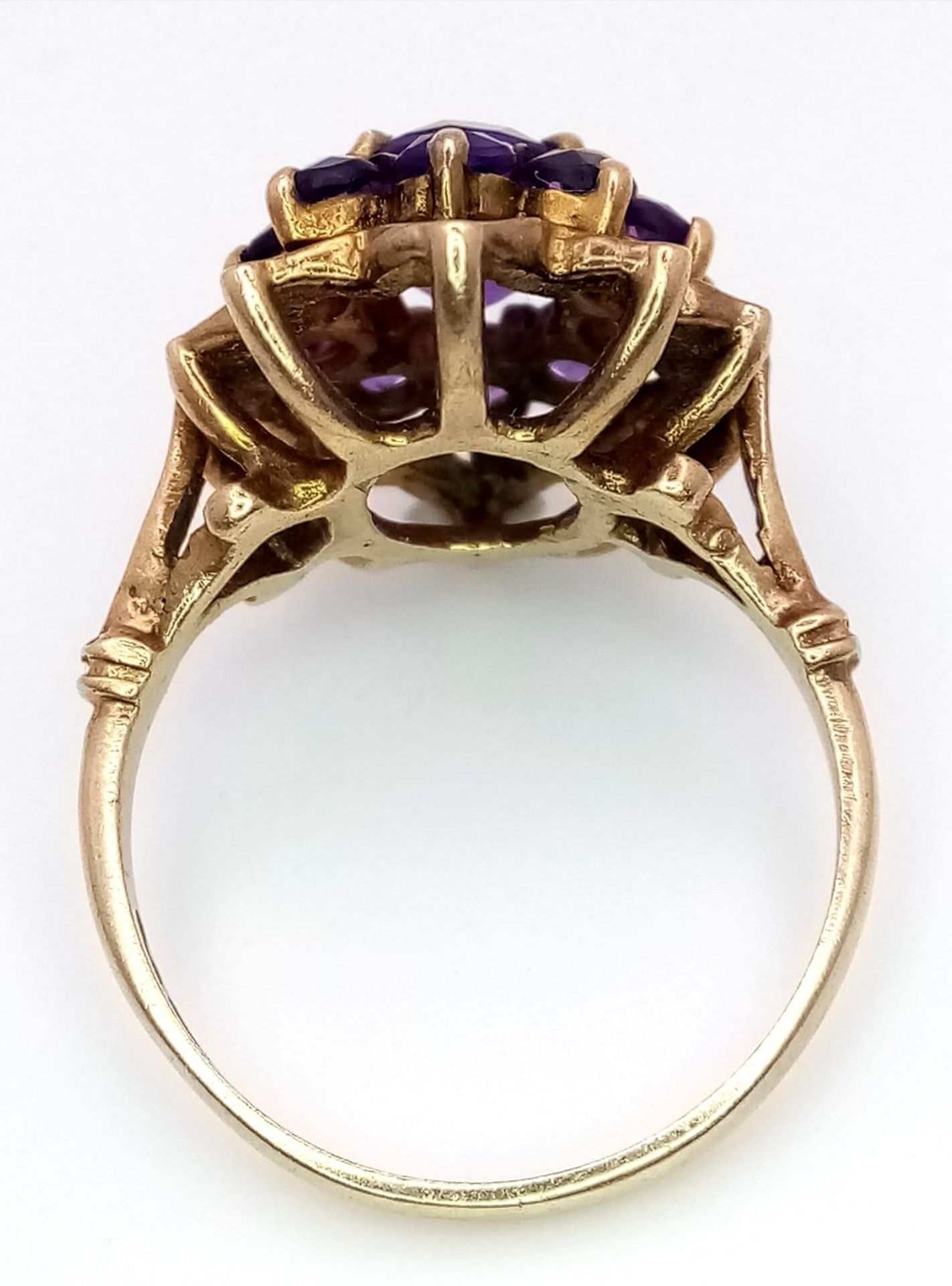 A Vintage 9K Yellow Gold Amethyst Ring. Central oval cut amethyst with an amethyst halo. Size M. 4. - Image 3 of 4