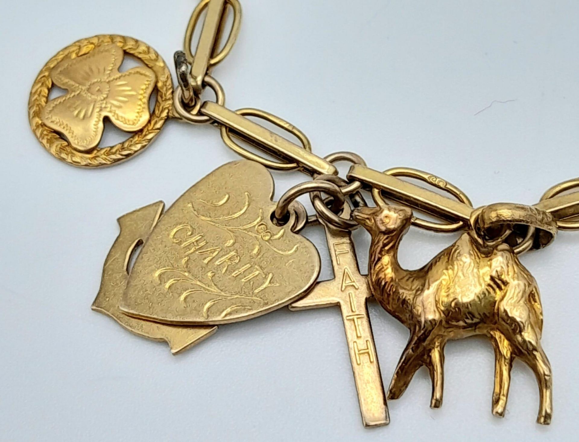 A 9K Yellow Gold Charm Bracelet. Eight charms including Elephant! 10.65g weight. - Image 2 of 6