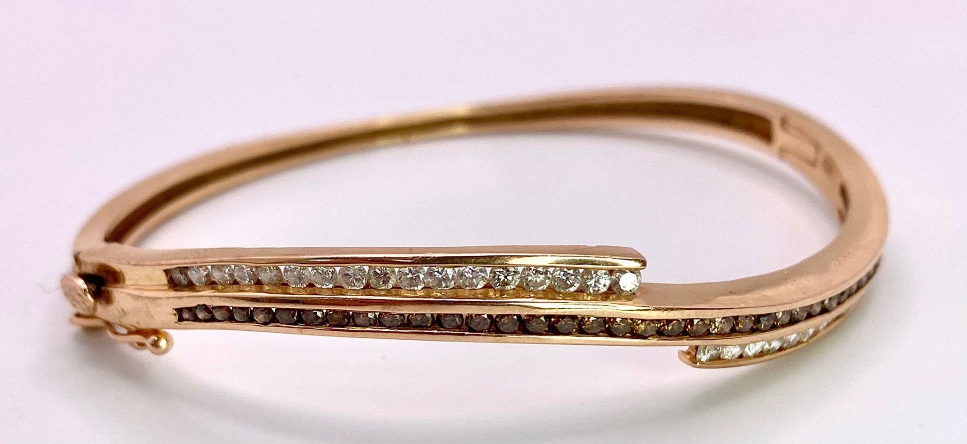 A 14K Rose Gold, White and Cognac Brown Diamond Wave Bangle. Over 60 round cut diamonds ride on a - Image 3 of 9