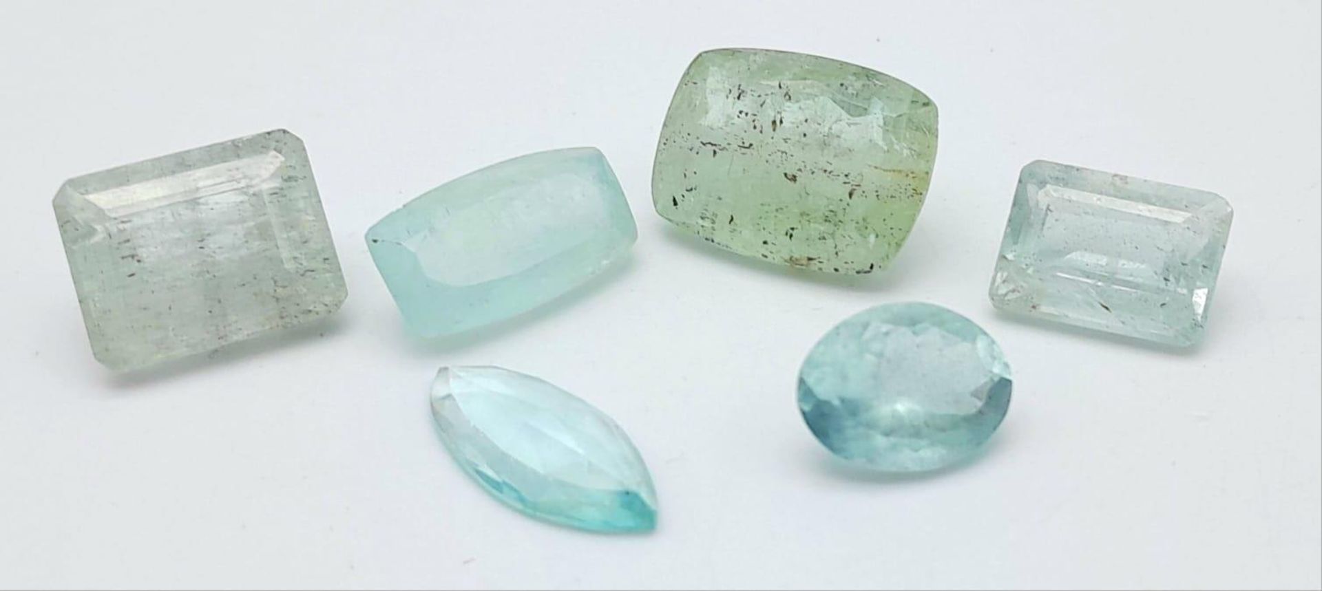 A 44.05ct Faceted Aquamarine Gemstones Lot of 6 Pieces. Mixed Shapes.
