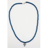 A Blue Hematite Necklace with a Cross Pendant. 40cm