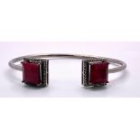 A Step Cut Ruby and Diamond Surround 925 Silver Cuff Bracelet. Rubies - 16.95ctw. Diamonds - 0.