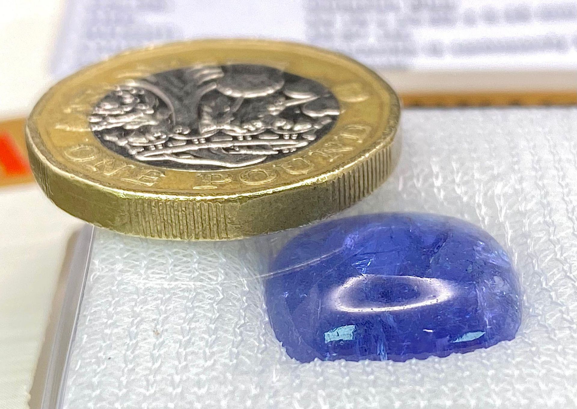 A 10.87ct Tanzania Natural Tanzanite Gemstone, in the Cushion Cabochon shape. Comes with the AIG - Image 3 of 5