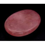 A 68.50ct Natural Madagascar Rose Quartz, in Oval Cabochon shape. Comes with the GLI certificate.