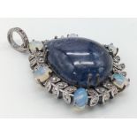 A 31.25ct Tanzanite Cabochon Gemstone Pendant with 1.80ctw Opal and 0.40ctw Diamond Floral