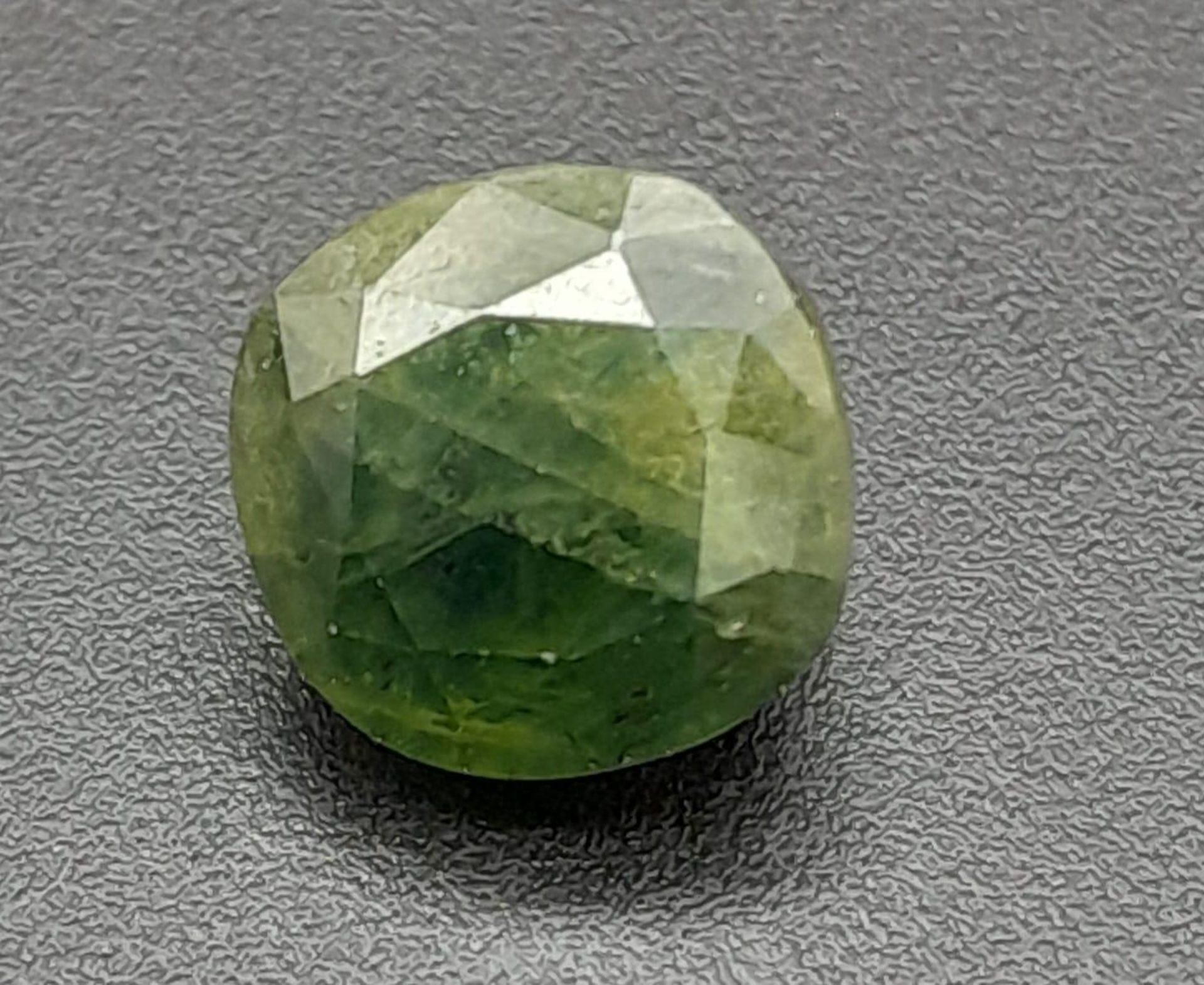 A 5.69ct Cushion Cut Bluish Green Sapphire Madagascar Origin. GGI Certified. - Image 2 of 4