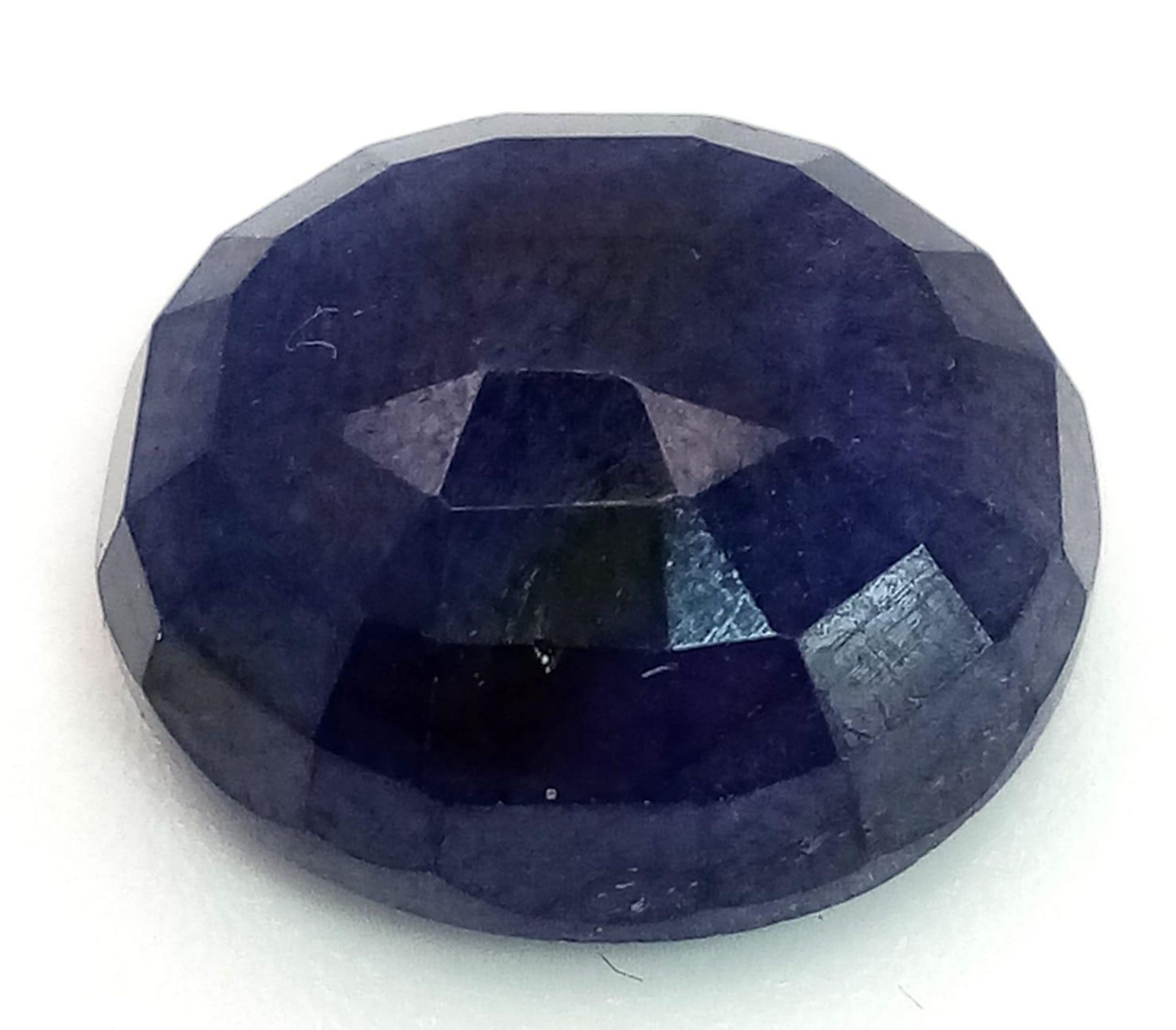 A 12.30ct Natural Translucent Blue Sapphire, Oval Faceted cut. Comes with the GLI certificate. - Bild 3 aus 4