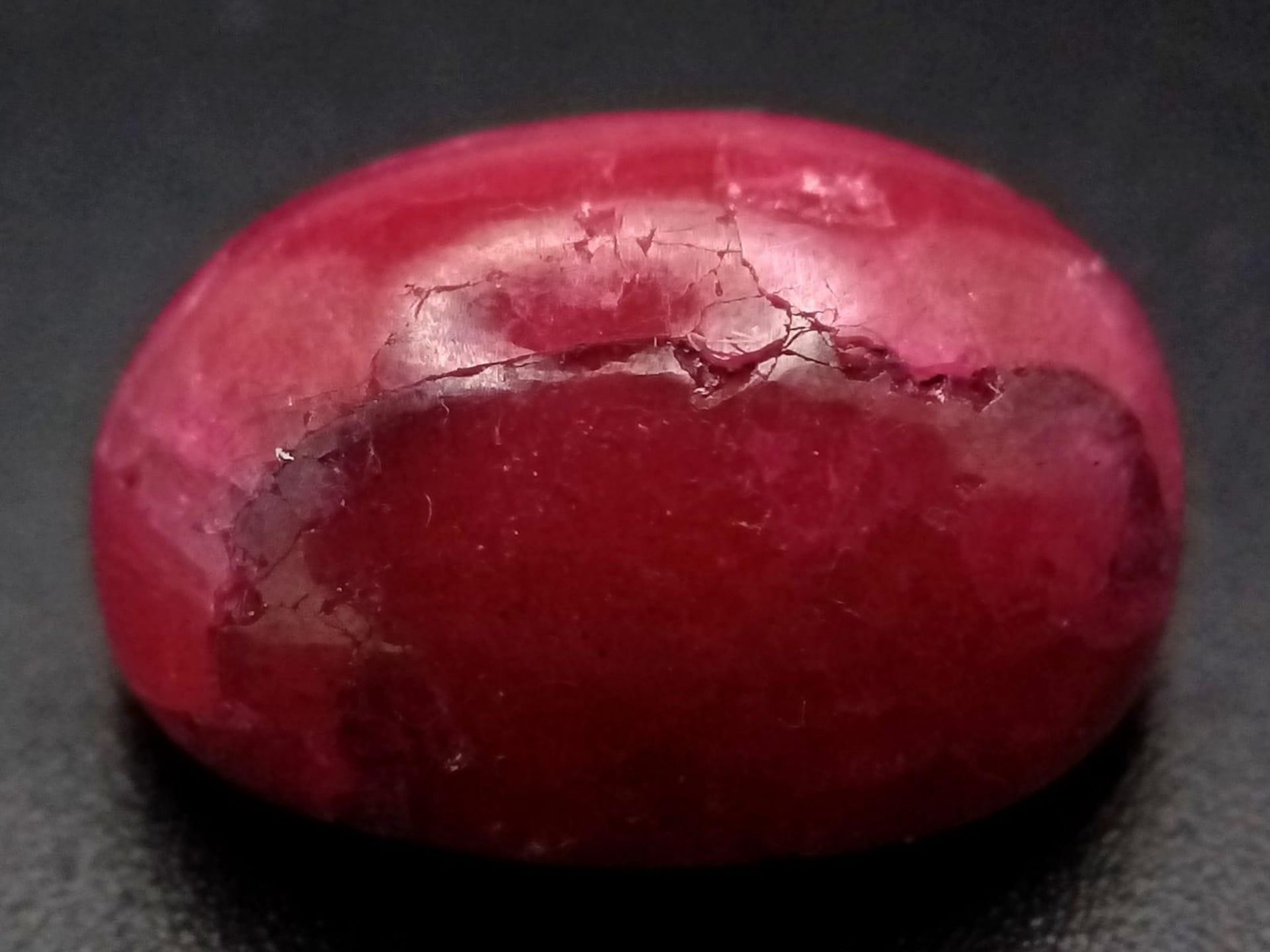 A 22.20ct Natural Ruby, in Oval Cabochon shape. Comes with the GLI certificate. - Bild 2 aus 4