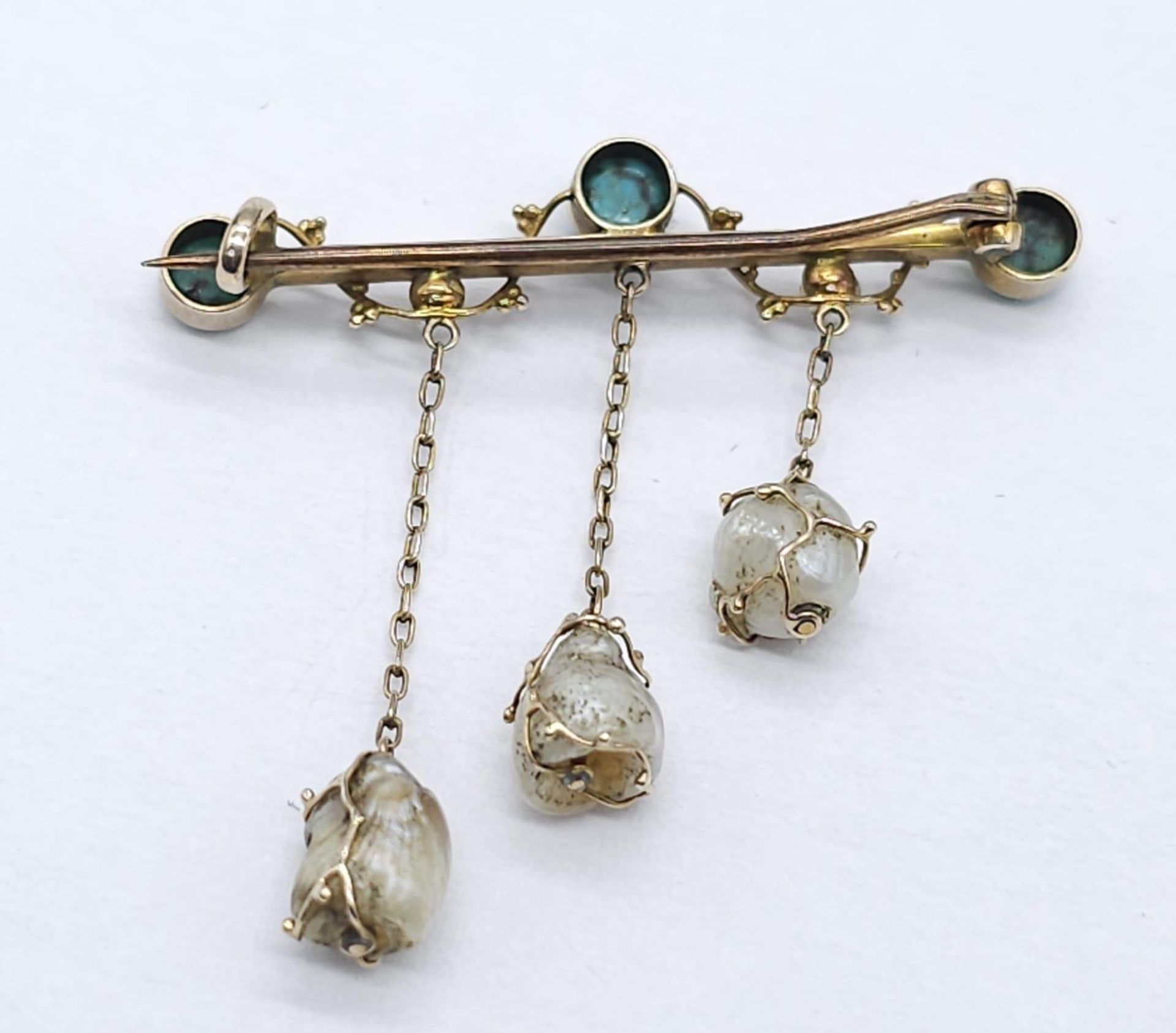 An Antique Gold, Turquoise and Pearl Bar Brooch. Three turquoise cabochons complimented with three - Image 7 of 9