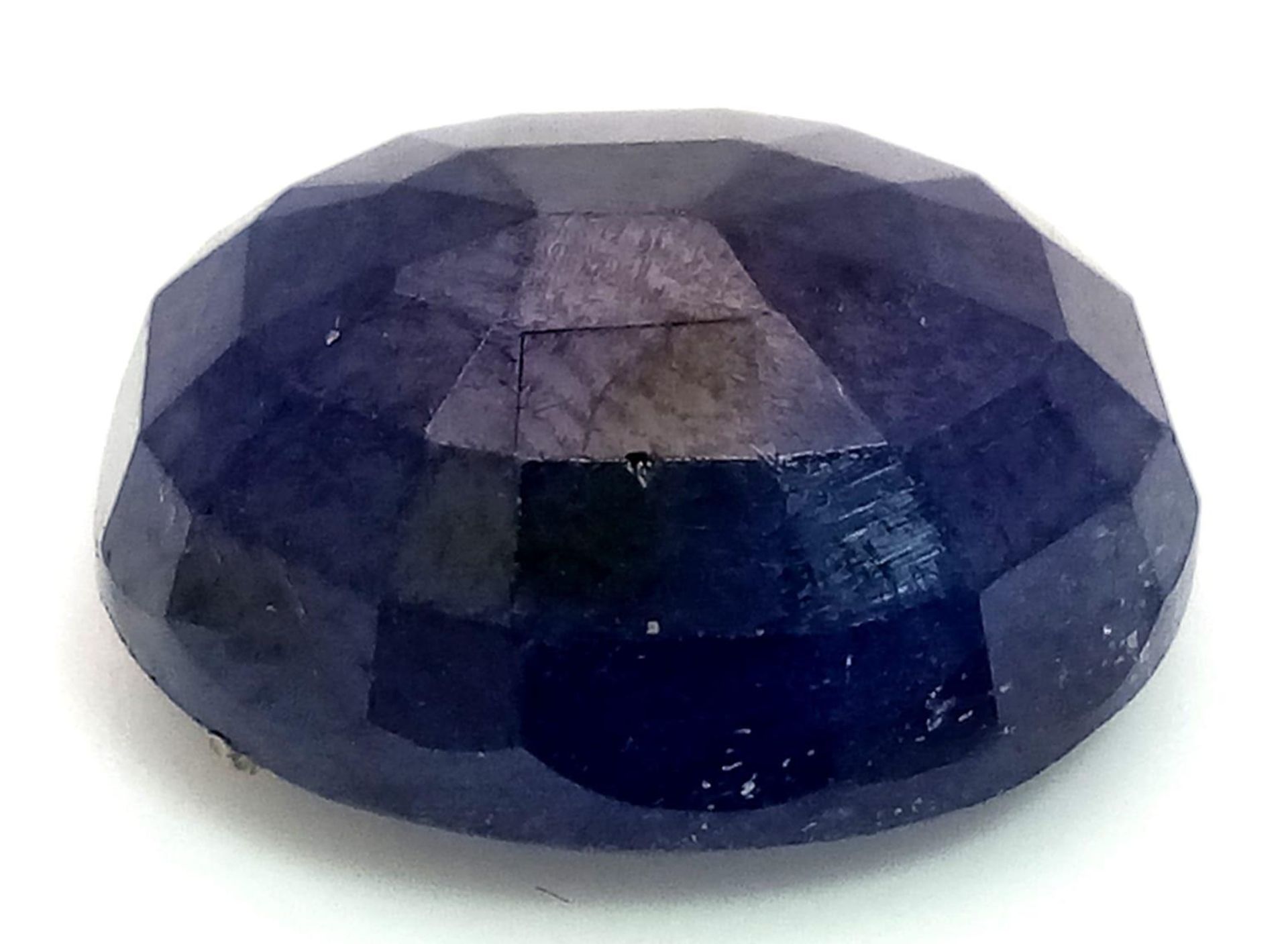 A 12.30ct Natural Translucent Blue Sapphire, Oval Faceted cut. Comes with the GLI certificate. - Bild 2 aus 4