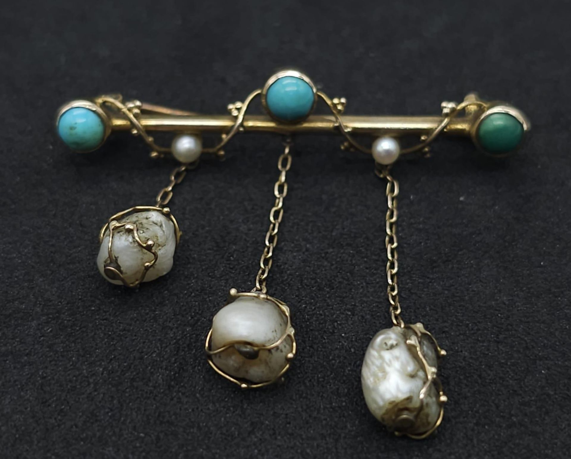 An Antique Gold, Turquoise and Pearl Bar Brooch. Three turquoise cabochons complimented with three - Image 4 of 9