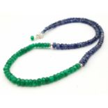 A 90ctw Emerald and Blue Sapphire Small Rondelle Bead Necklace with a 925 Silver Clasp. 44cm length.