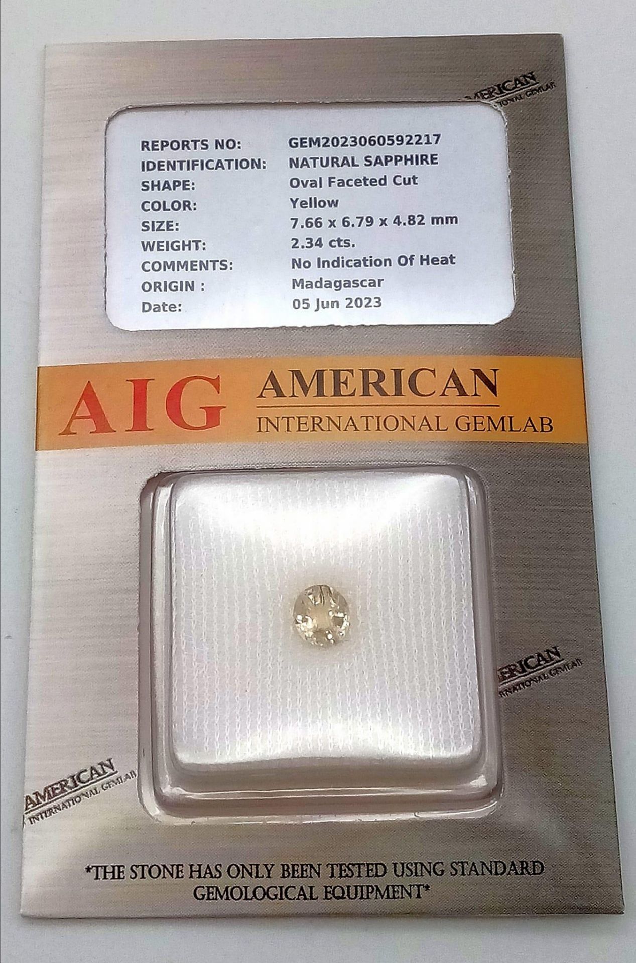 A 2.34ct Untreated Yellow Madagascar Sapphire - Sealed Container - AIG Certified. - Image 2 of 3