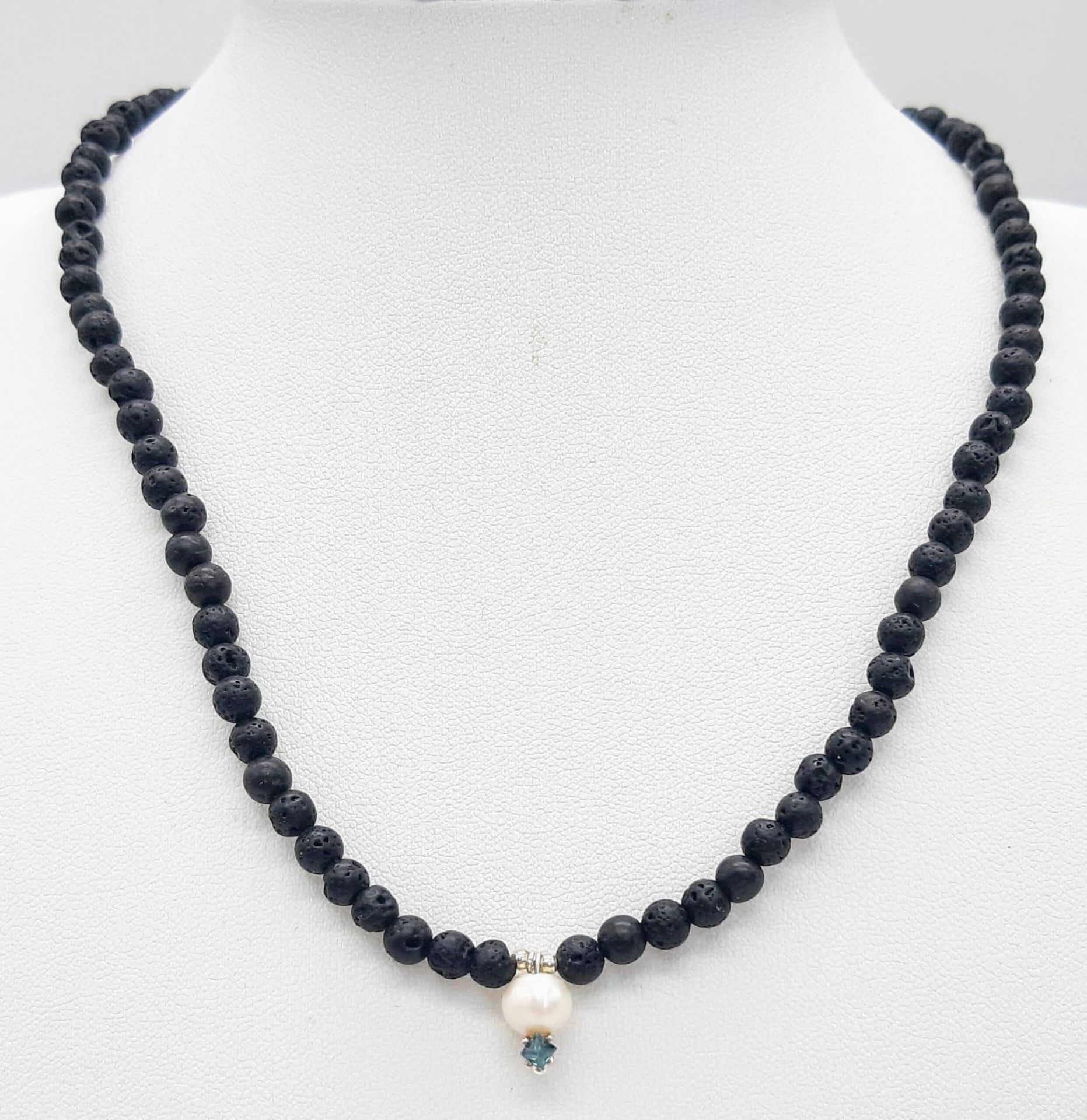 A Lava Volcanic Bead Necklace with Pearl and 0.10 Blue Diamond Pendant. 40cm. - Image 3 of 5