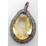 A Citrine Silver Pendant with Rose Cut Diamonds set in 925 Sterling Silver. Citrine- 26.55ctw.