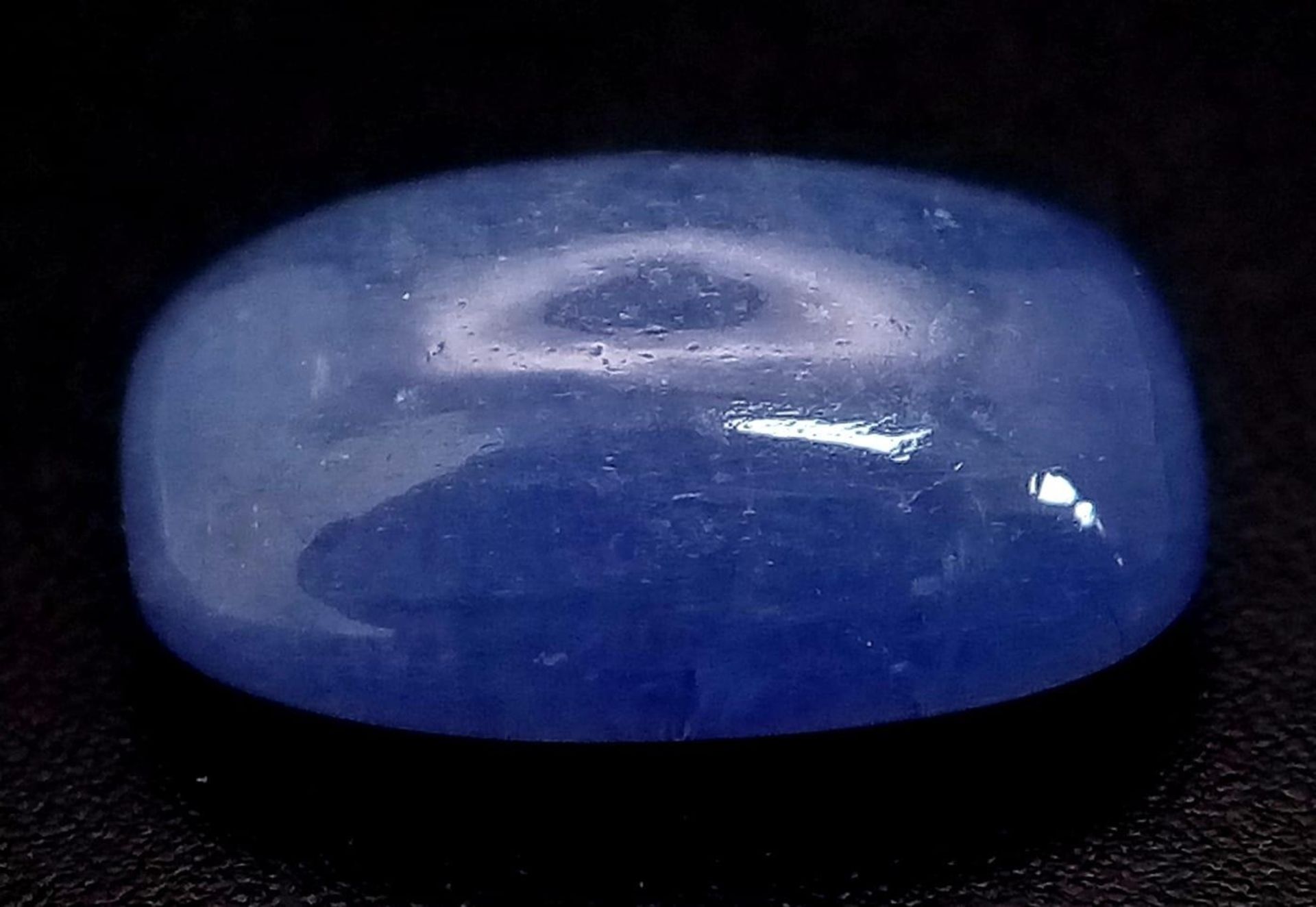 A 7.8ct Natural Tanzanite, in Cushion Cabochon shape. Comes with the GLI certificate. - Image 2 of 3