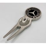 A Mercedes Benz Branded Putting Divot Tool. Detachable ball marker. 8cm. As new.