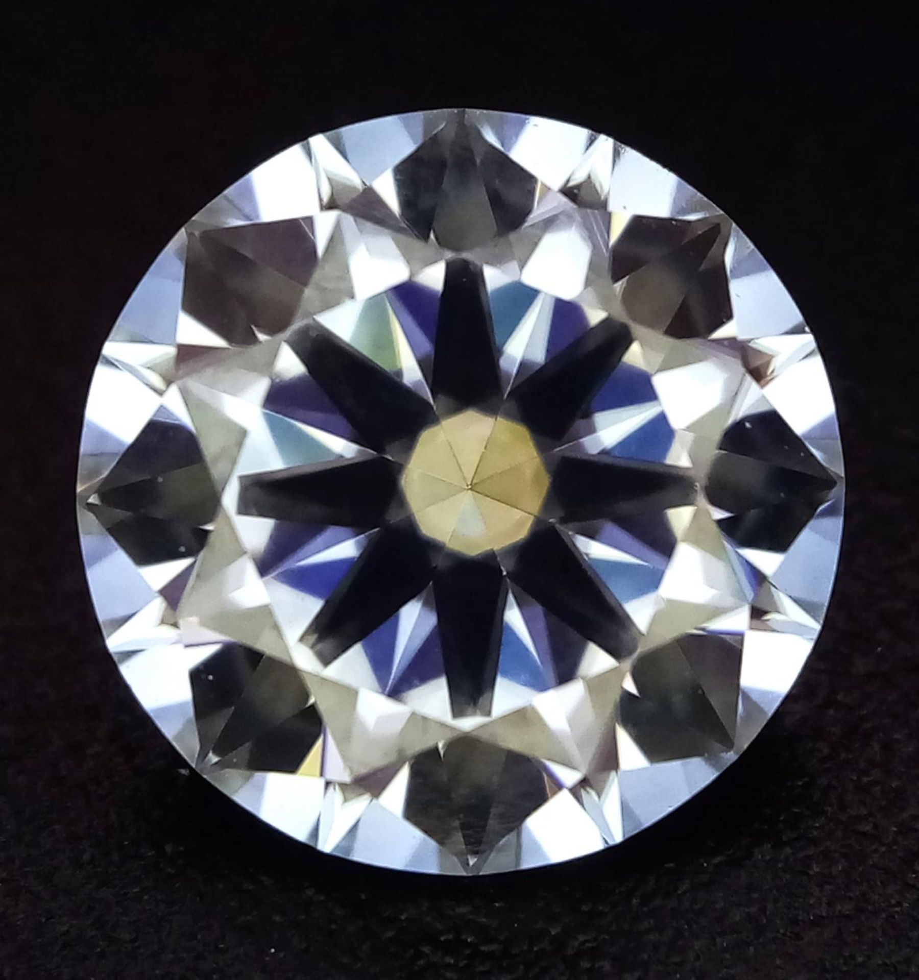 A 3ct VVS1 Round Cut Moissanite with Certificate.