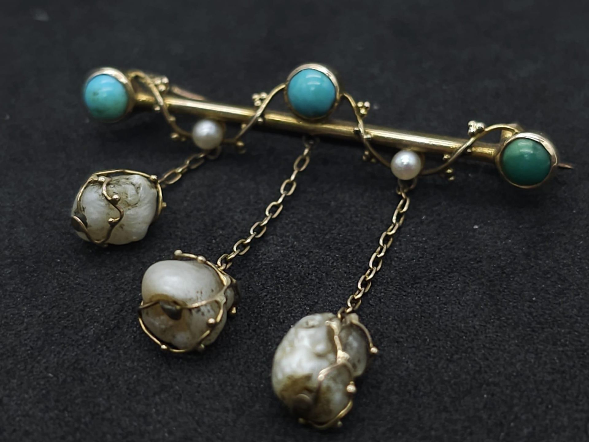 An Antique Gold, Turquoise and Pearl Bar Brooch. Three turquoise cabochons complimented with three - Image 2 of 9