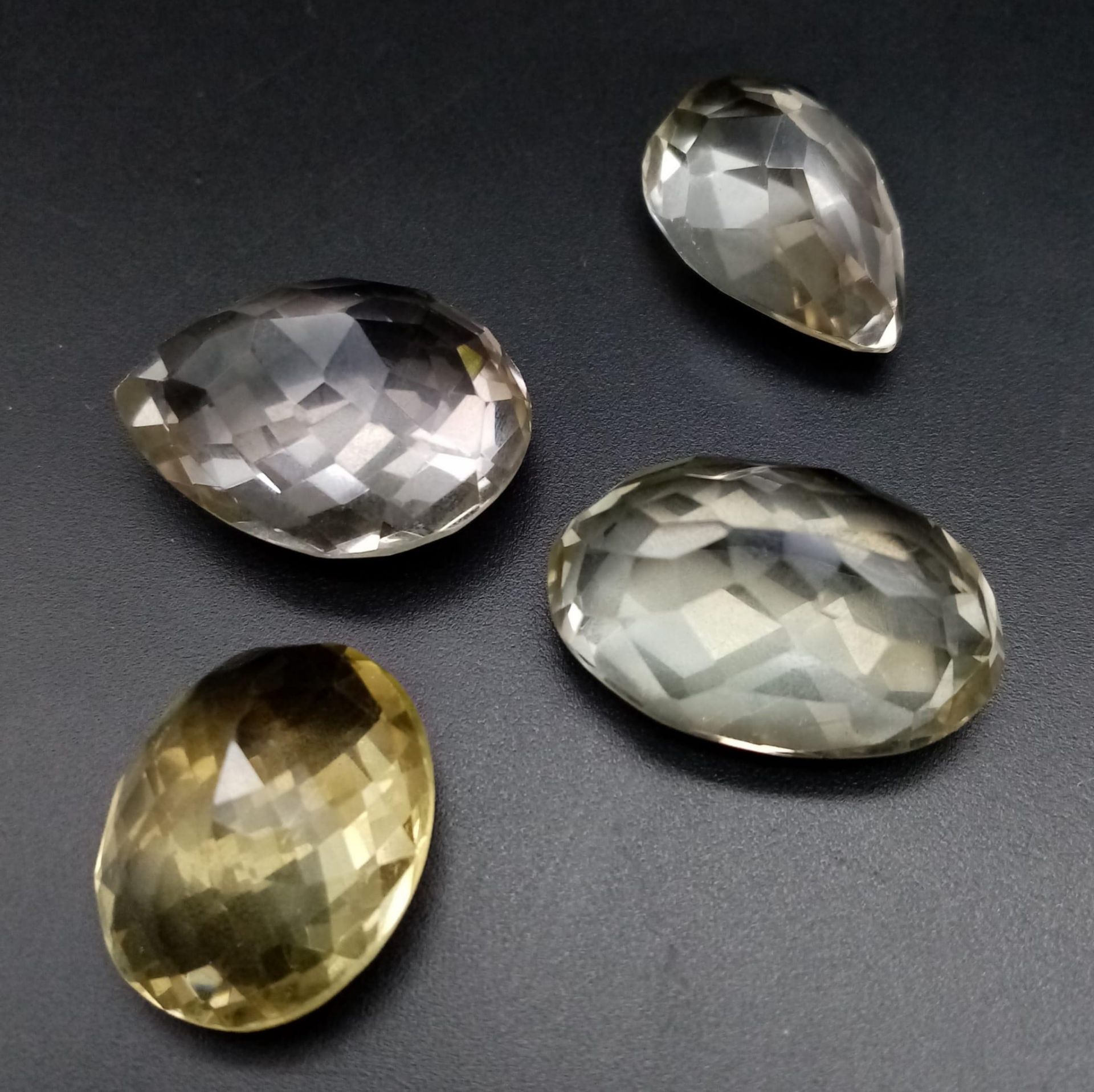 A lot of 105Ct Faceted Natural Earth Mined Bi Colour Quartz Eye Clean. Mixed Shapes. - Image 2 of 3