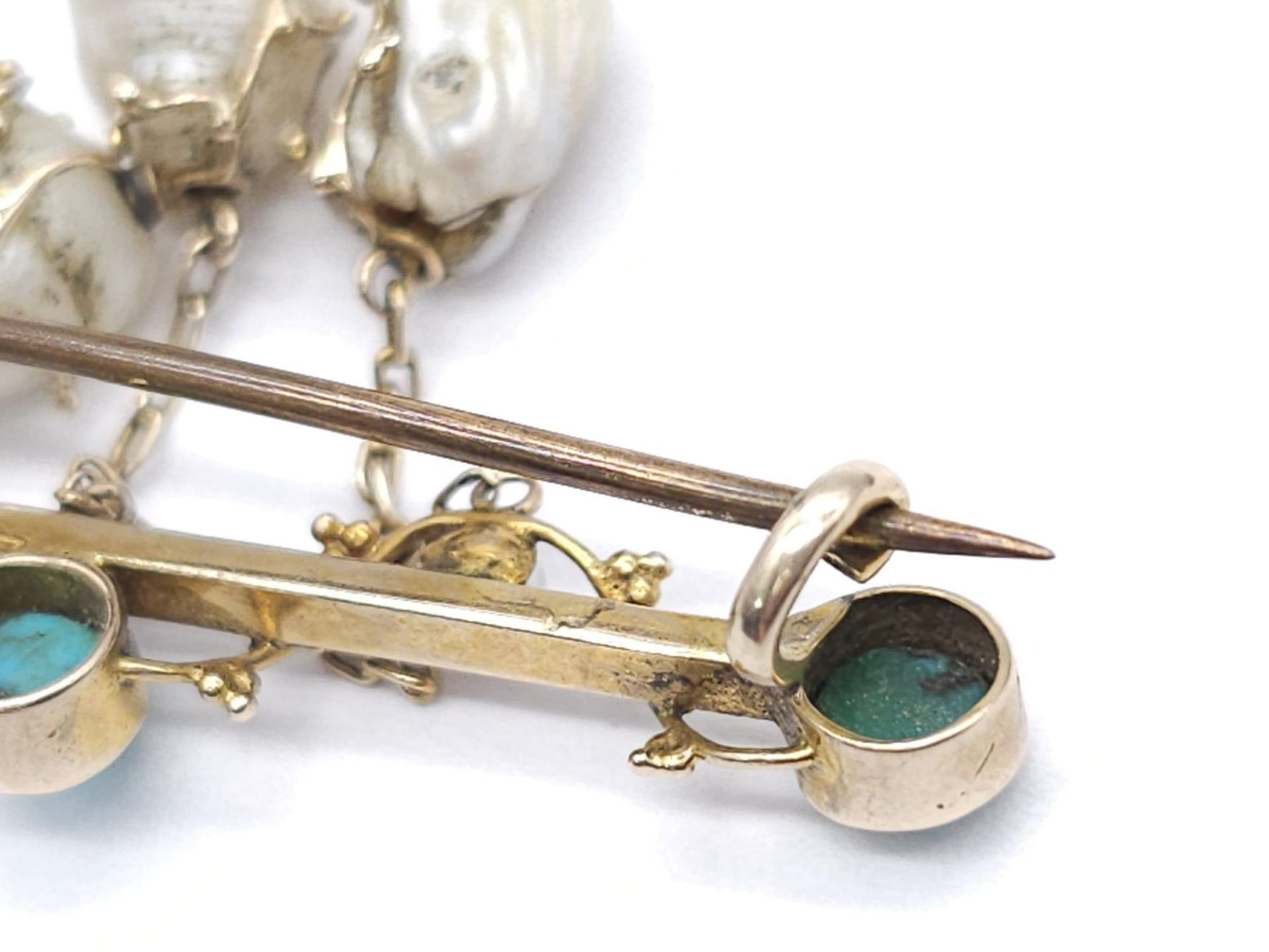 An Antique Gold, Turquoise and Pearl Bar Brooch. Three turquoise cabochons complimented with three - Image 8 of 9