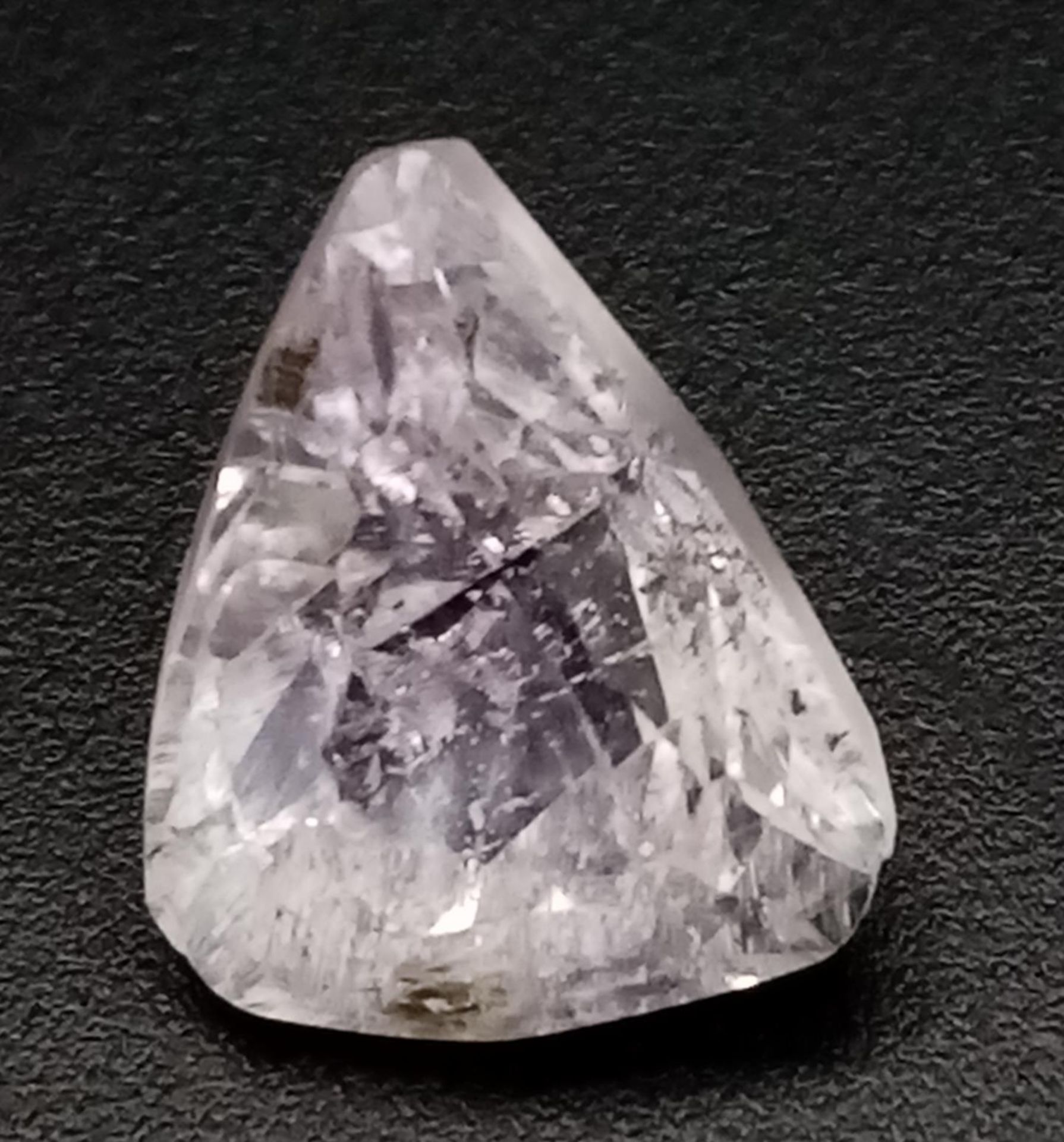 A 4.28CT Untreated Natural Kunzite in trillion cut.