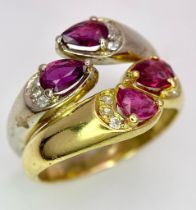 AN IMPRESSIVE 18K YELLOW AND WHITE GOLD SET WITH DIAMOND & RUBY DOUBLE BAND RING, APPROX 0.80CT TEAR