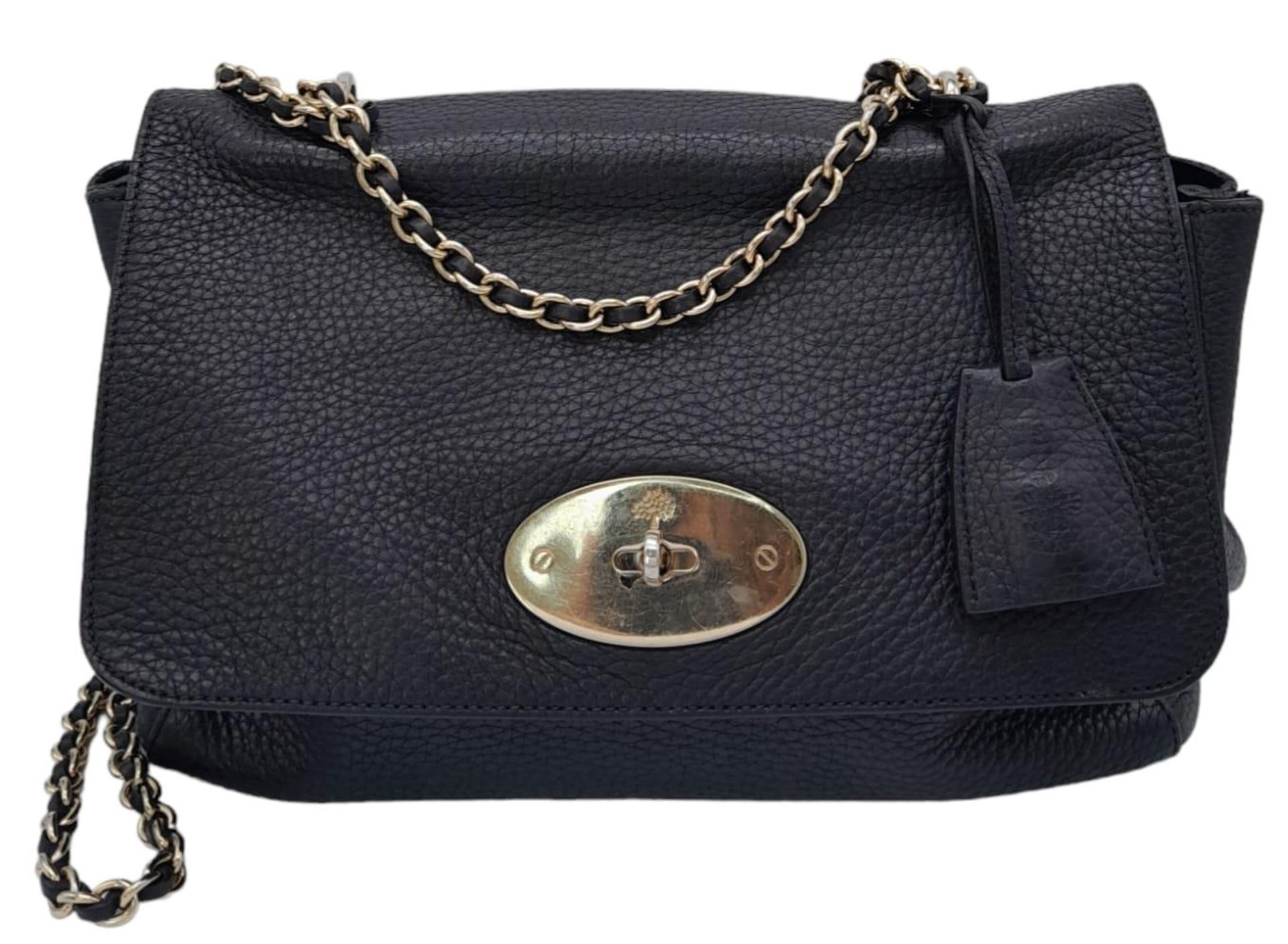 A Black Mulberry Lily Bag. With a Classic Grain Leather, Flap Over Design, Signature Postman Style