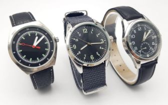 A Parcel of Three Unworn Military Homage Watches Comprising; 1) 1950’s Design British Army Watch (