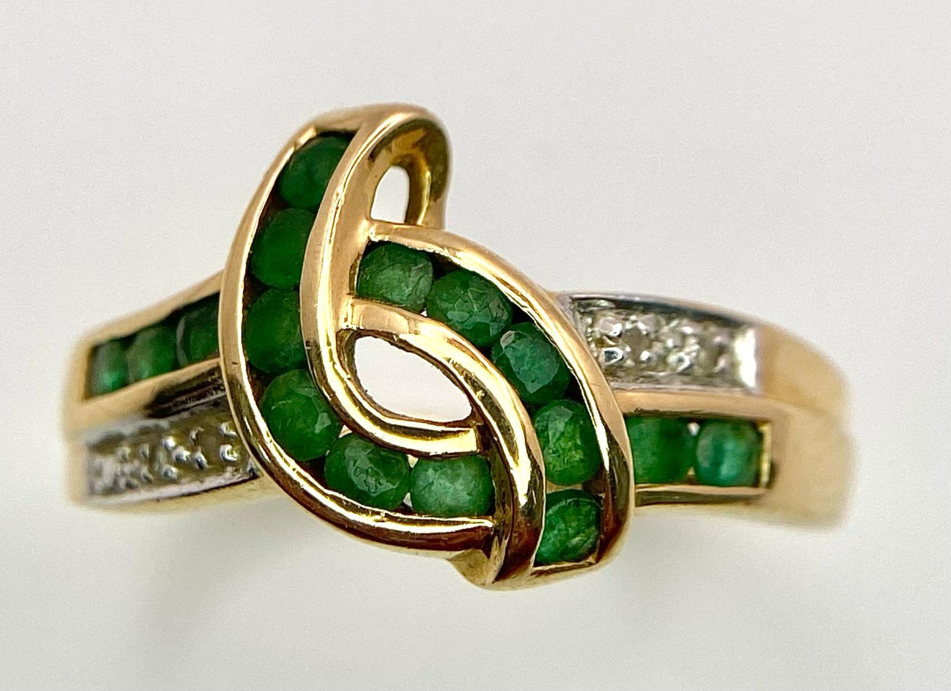 A 14K GOLD DIAMOND AND EMERALD RING . 3.3gms size O - Image 3 of 6