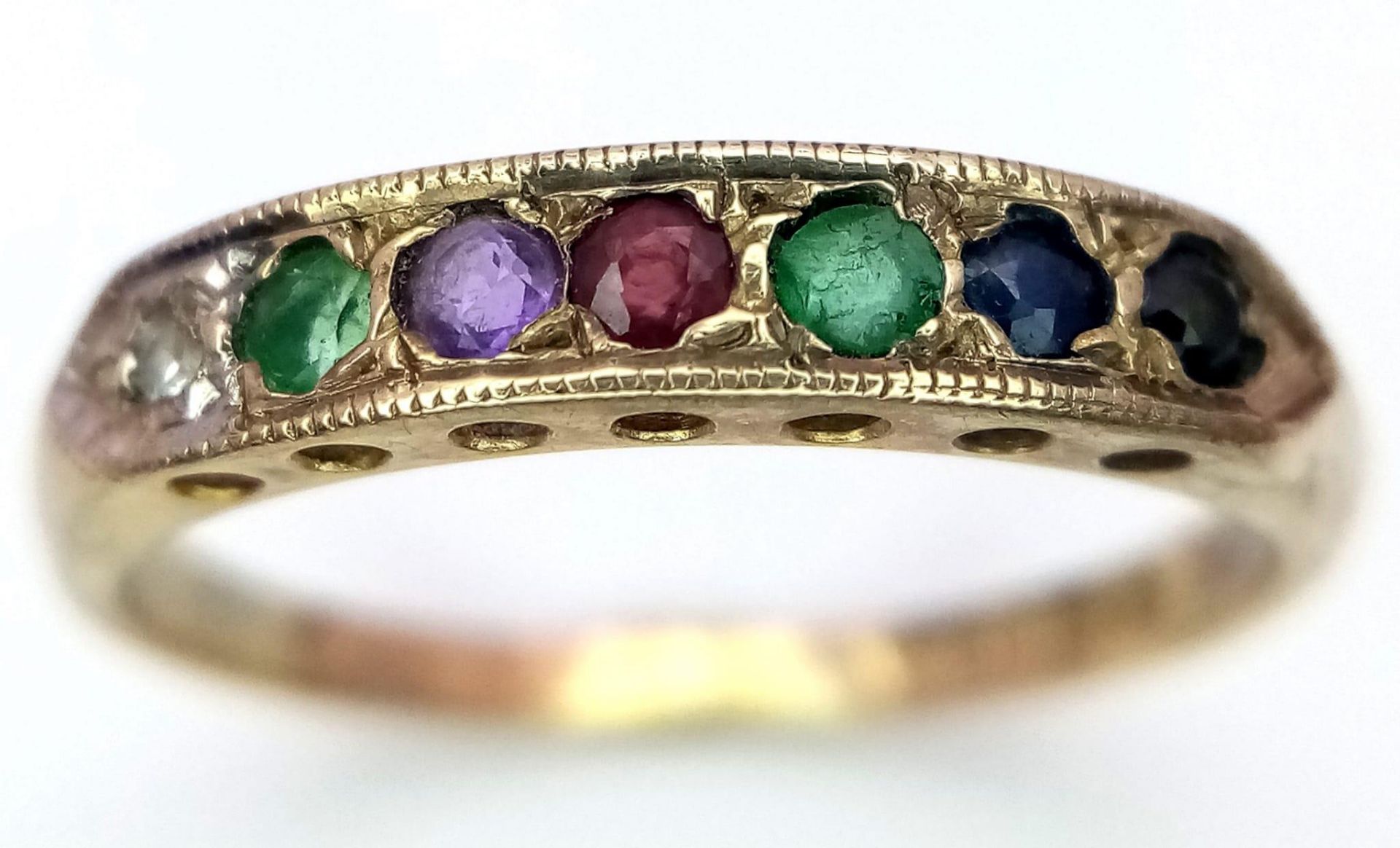 A VINTAGE 9K YELLOW GOLD DEAREST RING SET WITH DIAMOND, EMERALD, AMETHSYT, RUBY, EMERALD, SAPPHIRE - Image 2 of 5