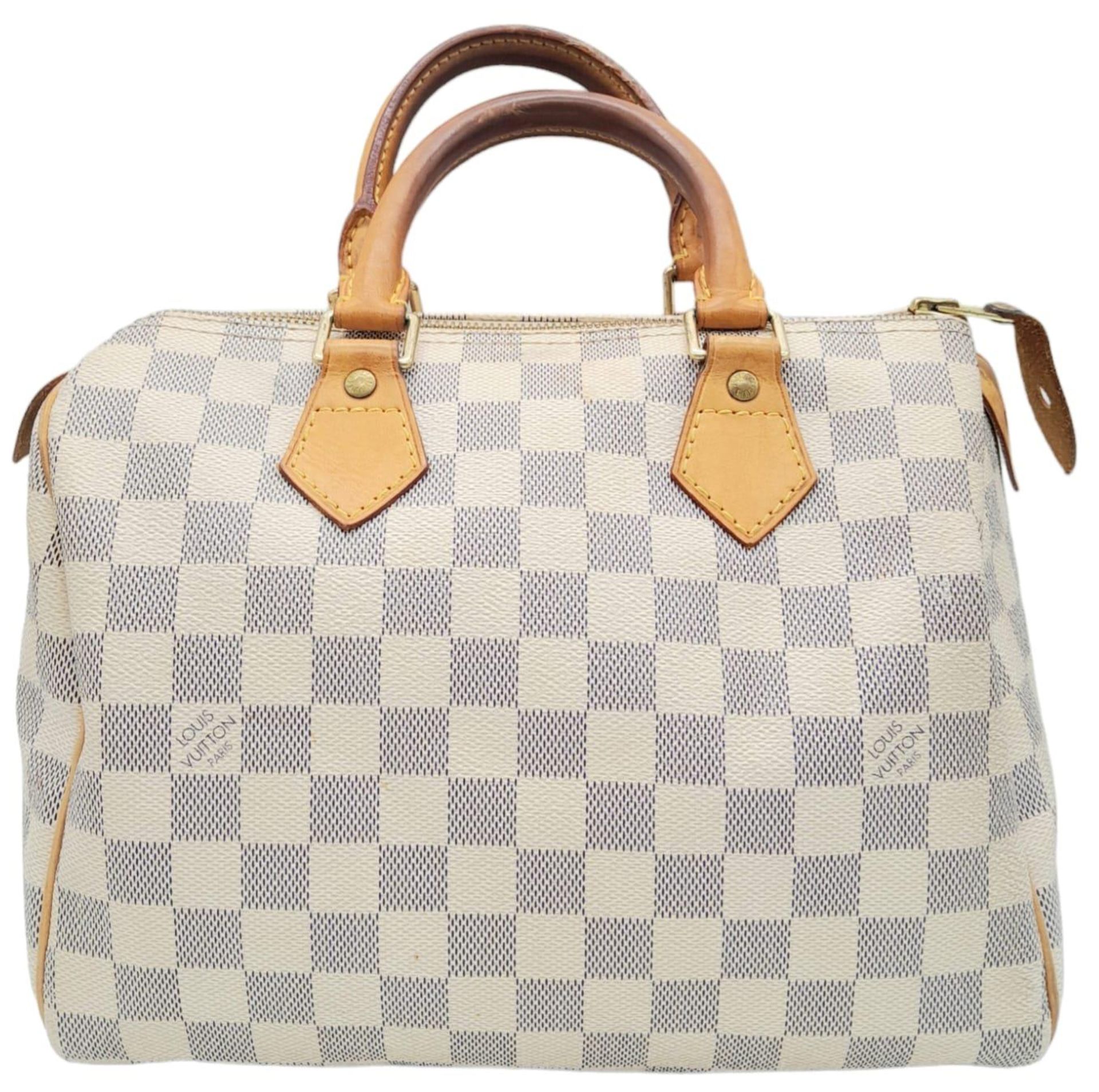 A Louis Vuitton White Canvas Damier Azur Speedy Handbag. Leather exterior, Rolled leather handles, a - Bild 2 aus 7