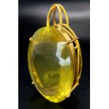 An Oval Shape Brazilian Lemon Quartz Pendant set in Gold Plated 925 Silver. Weight - 34.50g. Lemon